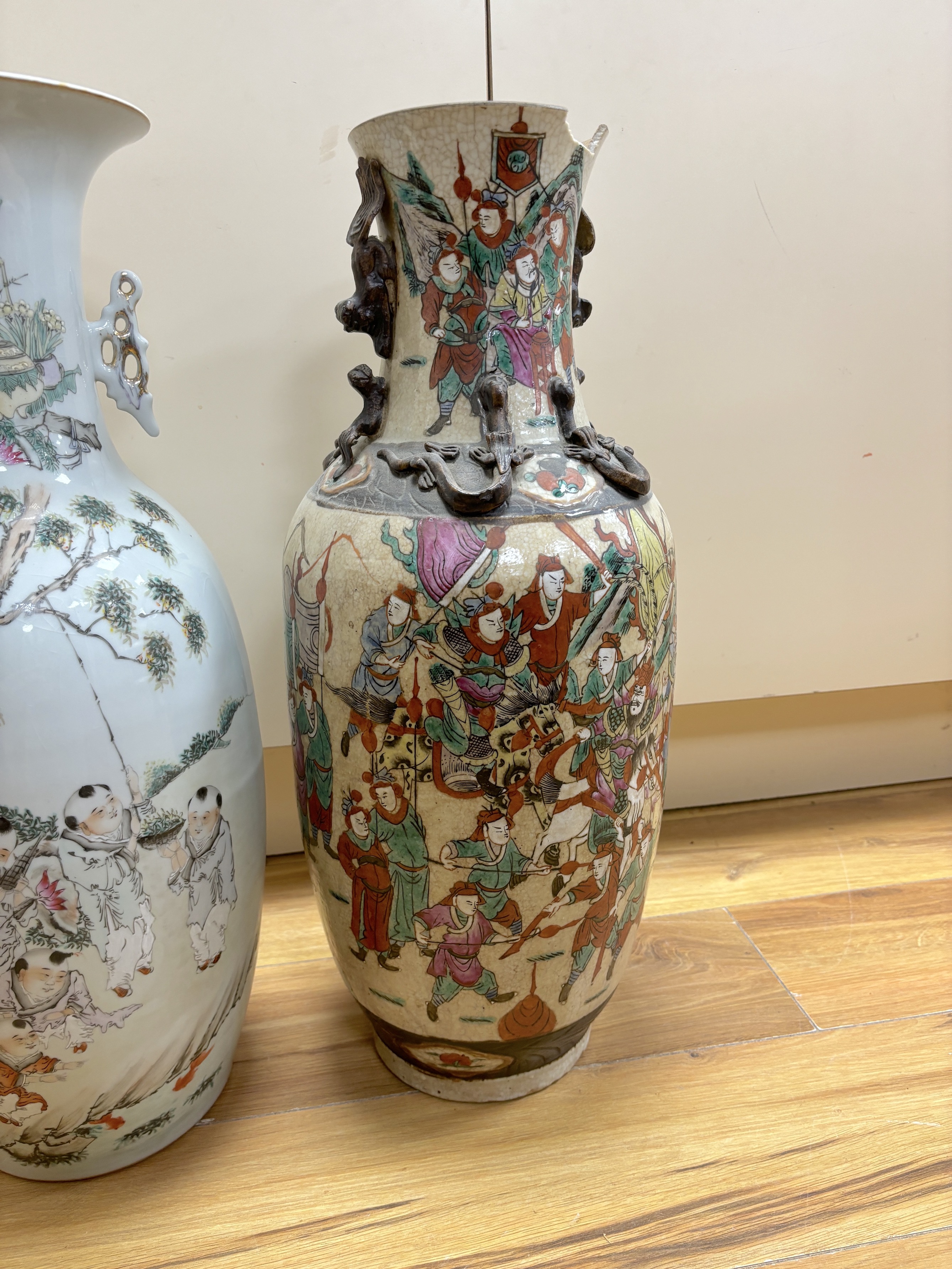 An early 20th century Chinese famille rose crackle glaze vase (damaged) and another, tallest 58cm